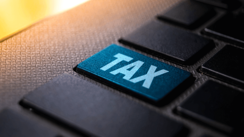 Tax key highlighted on a computer keyboard